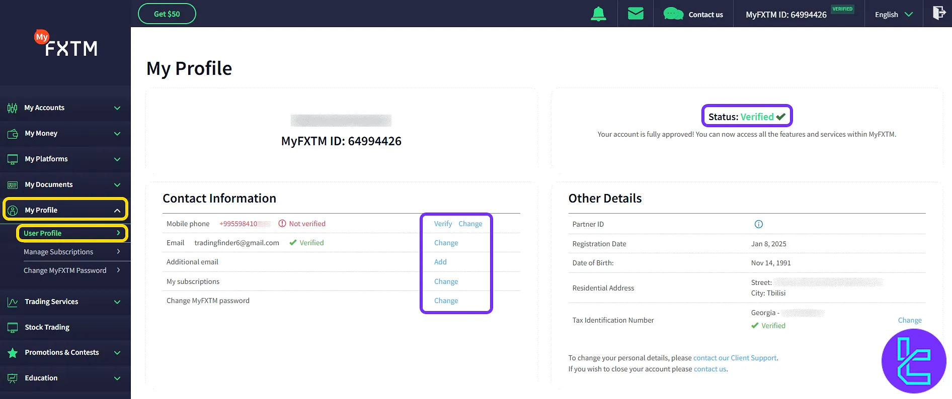 FXTM profile page with editable contact info in the user area